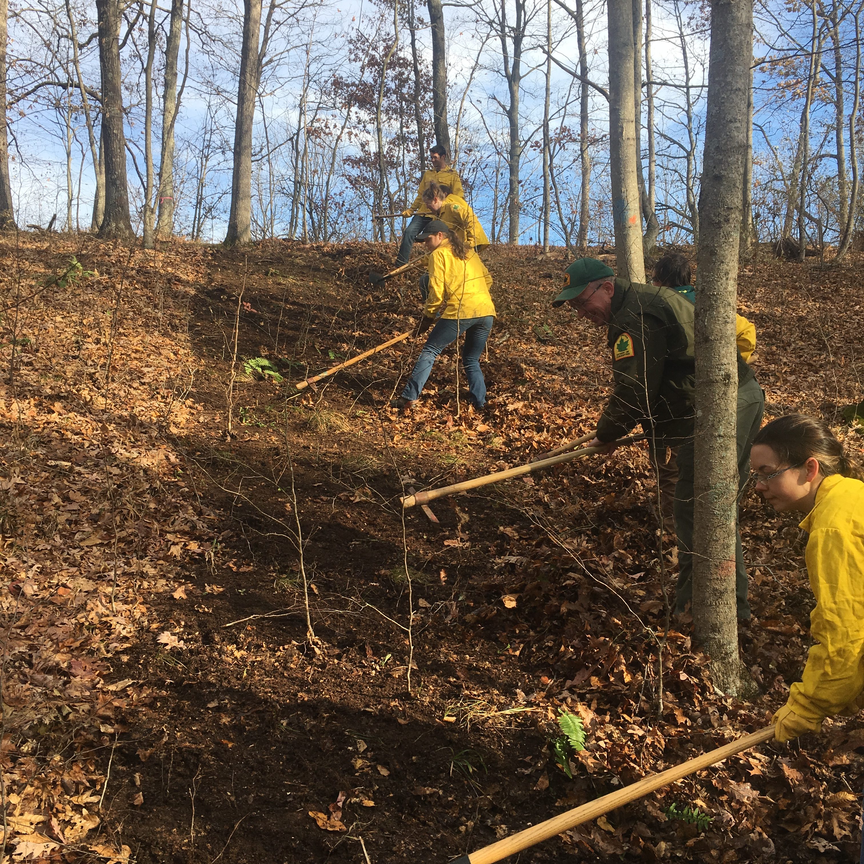 students are constructing fire lines for suppression of wildfire activities as part of the S130/S190 training